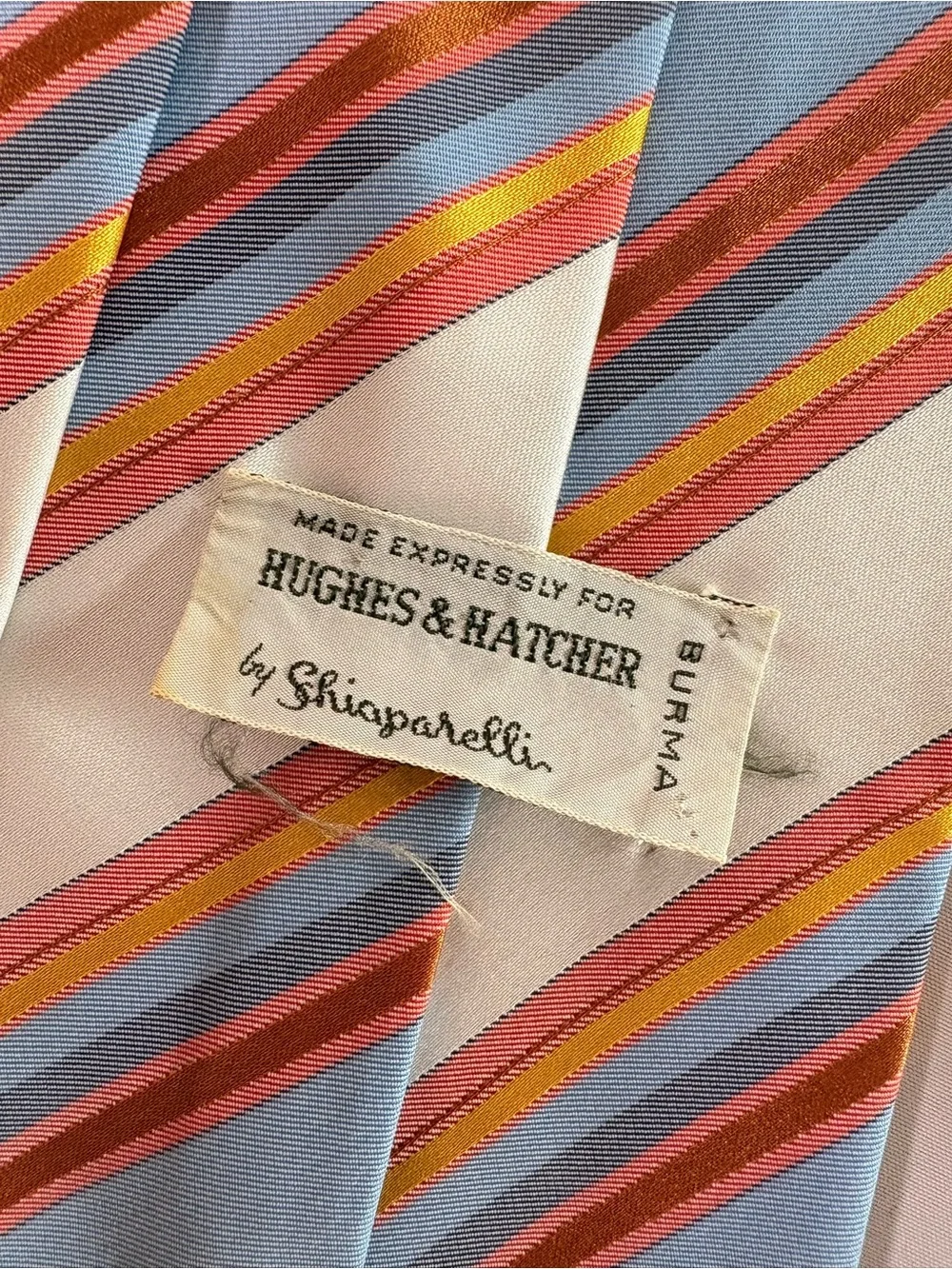 Light Blue Striped Men's Tie with Red and Orange Accents